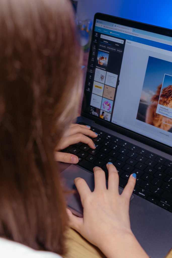 Child working on a laptop, showing focus and creativity, representing how empowering neurodivergent children with technology can nurture independence and confidence.