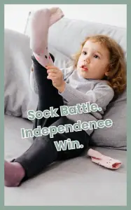 Young child putting on socks independently, symbolizing empowering independence in ND children.