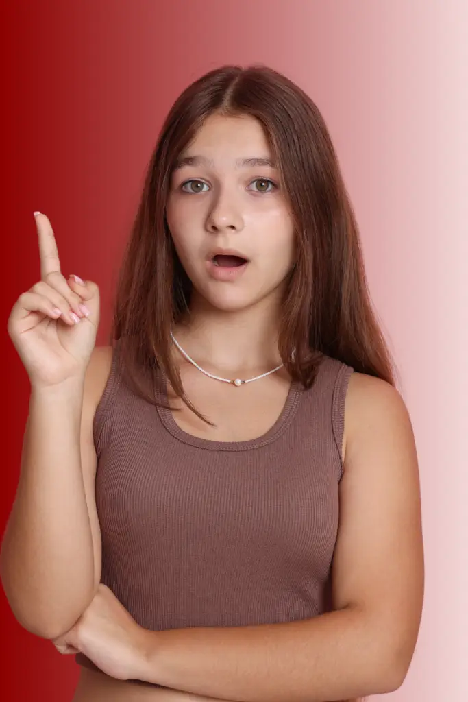 Neurodivergent child expressing a thought, illustrating AuDHD parenting and how autism and ADHD overlap in communication and regulation.